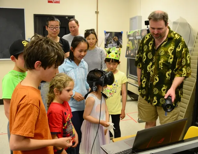 Medical entomologist Geoffrey Attardo and his "Virtual Reality Bugs" demonstration drew participants all day long at the 2018 UC Davis Picnic Day. He'll do so again this Saturday. (Photo by Kathy Keatley Garvey)