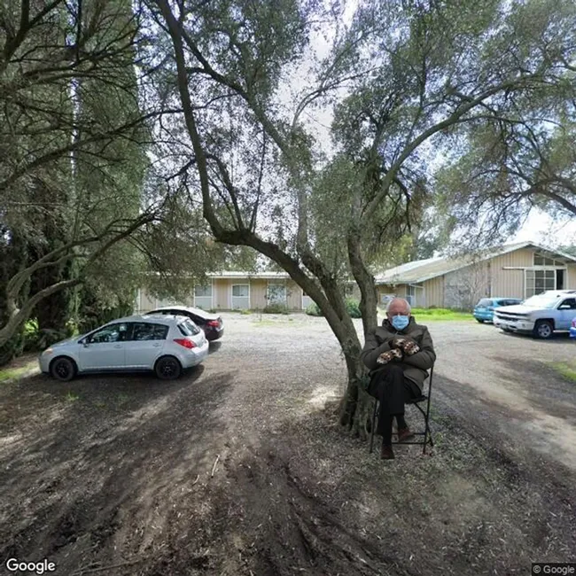 Bernie Sanders in front of the Harry H. Laidlaw Jr. Honey Bee Research Facility on Bee Biology Road, UC Davis.