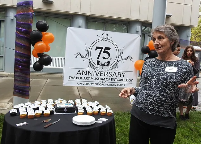Lynn Kimsey, director of the Bohart Museum of Entomology and a UC Davis distinguished professor of entomology, addresses the crowd at the 75th anniversary party hosted last Saturday by the Bohart Museum Society. (Photo by Kathy Keatley Garvey)