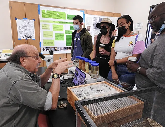 Forensic entomologist Robert "Dr. Bob" Kimsey talks about the importance of forensic entomology. He is the faculty coordinator of the UC Davis Department of Entomology and Nematology's Picnic Day activities. (Photo by Kathy Keatley Garvey)
