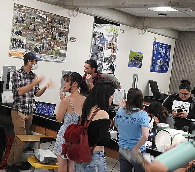 Cooperative Extension specialist and agricultural entomologist Ian Grettenberg (far left) responds to questions. (Photo by Kathy Keatley Garvey)