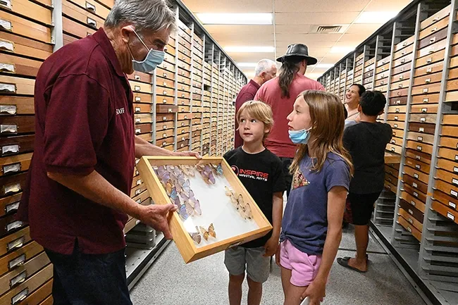 Niccoli and Clio Zebouni find the butterflies fascinating. (Photo by Kathy Keatley Garvey)