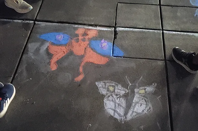 Feet and moths form this creative image. (Photo by Tabatha Yang)