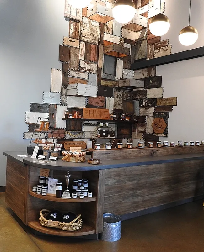 These are Ishai Zeldner's bee boxes displayed in The HIVE, Woodland, part of Z Specialty Food that he founded. (Photo by Kathy Keatley Garvey)