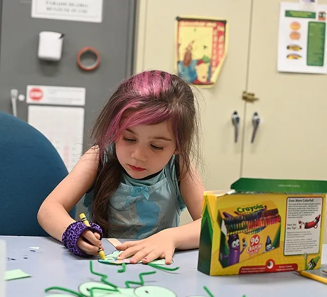 Soraya Qaqunah begins the process of creating her "Mantis on a Stick." (Photo by Kathy Keatley Garvey)