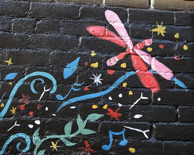 Close-up of an artist rendition (by Cheyenne Renee Marcus) of a flameskimmer dragonfly in downtown Vacaville. (Photo by Kathy Keatley Garvey)