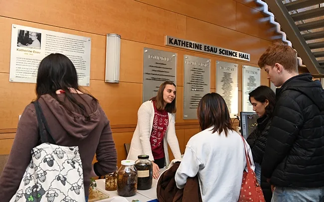 Alison Blundell, doctoral candidate, Department of Plant Pathology, answers a question. (Photo by Kathy Keatley Garvey)
