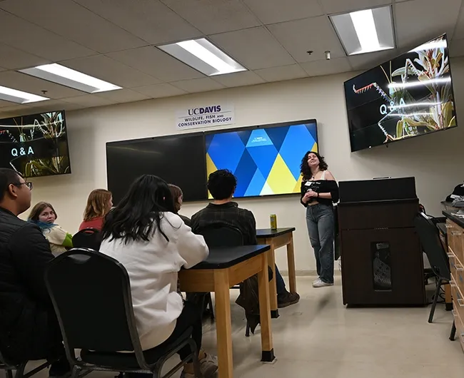 UC Davis student entomologist Sol Wantz begins her presentation on "Grasshoppers, Crickets and Katydids" at the Bohart Museum of Entomology open house. (Photo by Kathy Keatley Garvey)