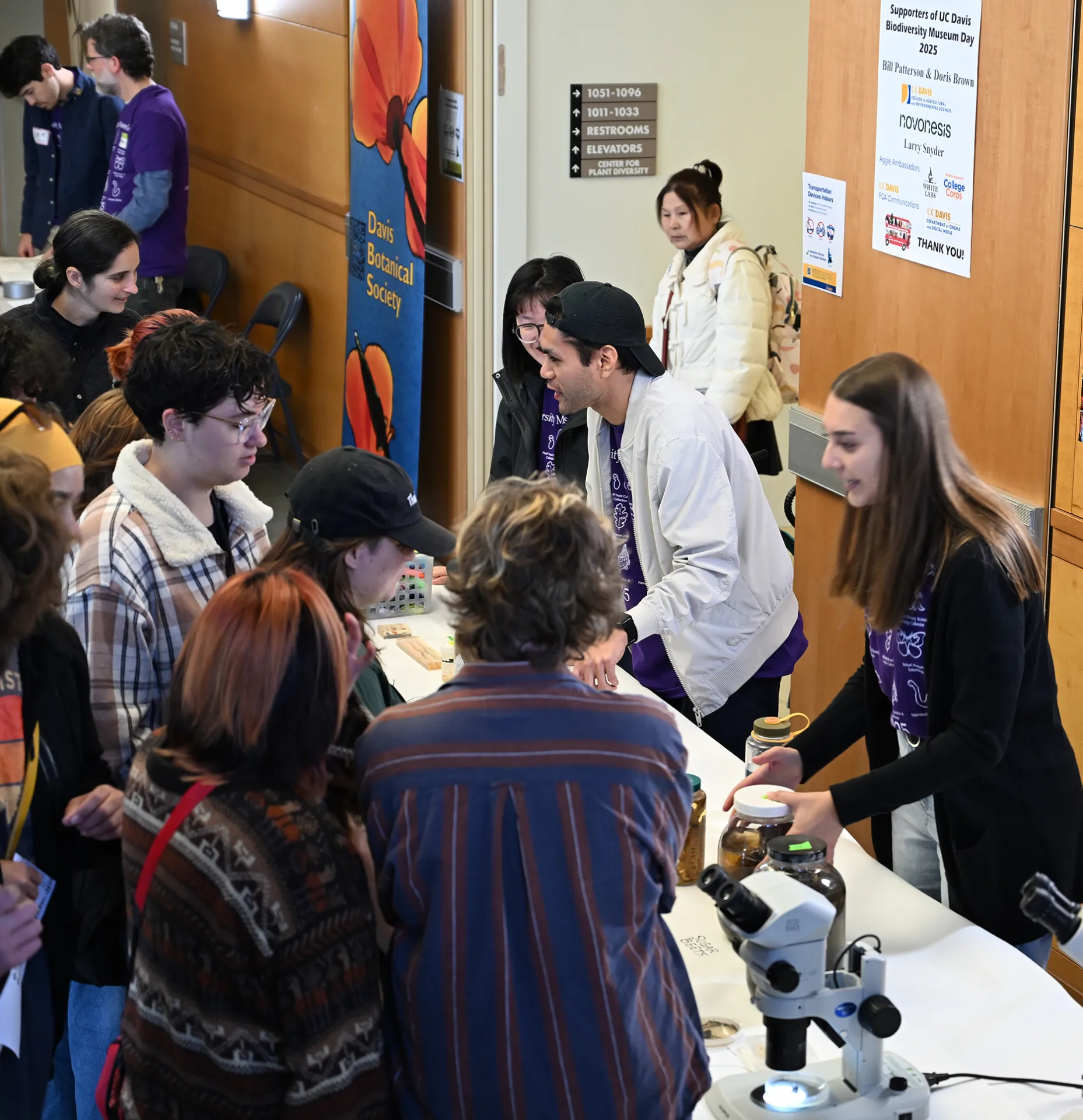 UC Davis doctoral candidate Alison Blundell, who studies with nematologist Shahid Siddique, explains what a nematode is at the 2025 Biodiversity Museum Day. (Photo by Kathy Keatley Garvey)