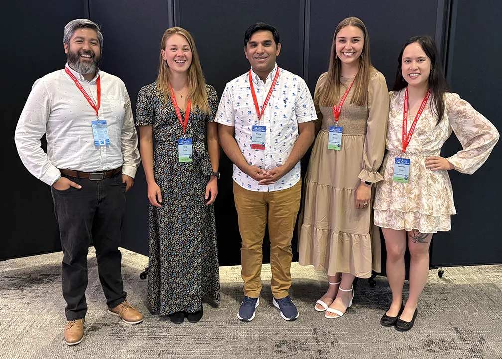 The Shahid Siddique lab shared the spotlight at the Society of Nematologists. From left are postdoctoral researchers Bardo Castro and Vera Putker; associate professor Siddique; and doctoral candidates Alison Blundell and Veronica Casey. 