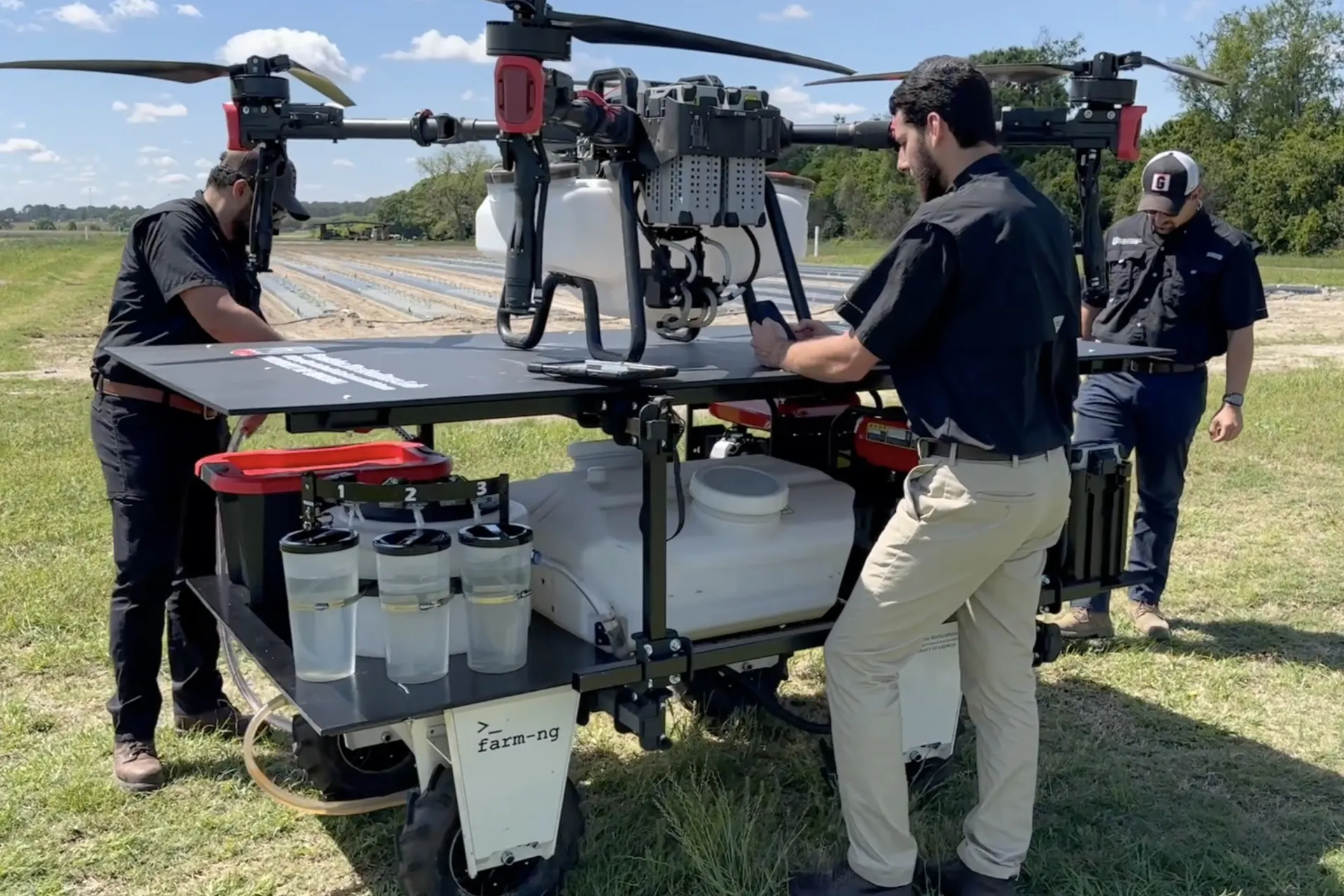 University of Georgia team works on the robotic platform that enables spraying drone operations controlled by a cell phone