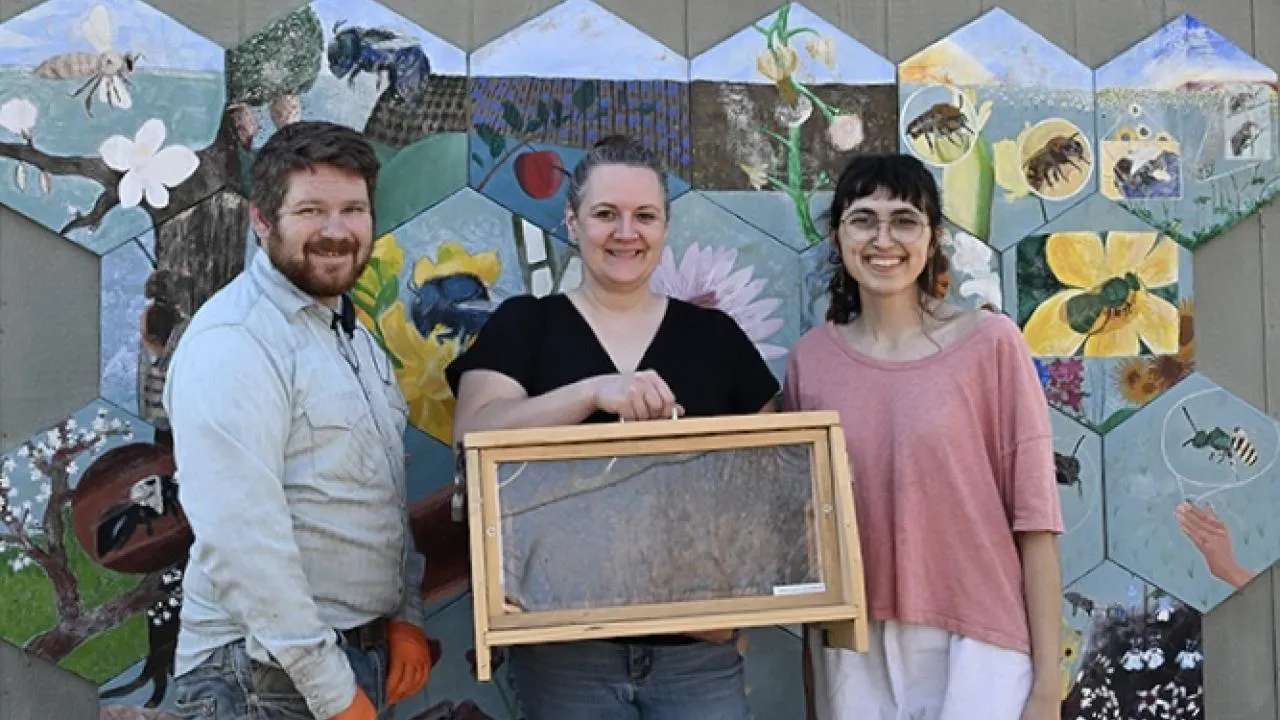 The team that takes care of the UC Davis Bee Haven includes (from left) Joseph Tauzer, who works on the irrigation system and other projects; Elina Nino, Haven director; and Samantha Murray, education and garden coordinator. (Photo by Kathy Keatley Garvey) 