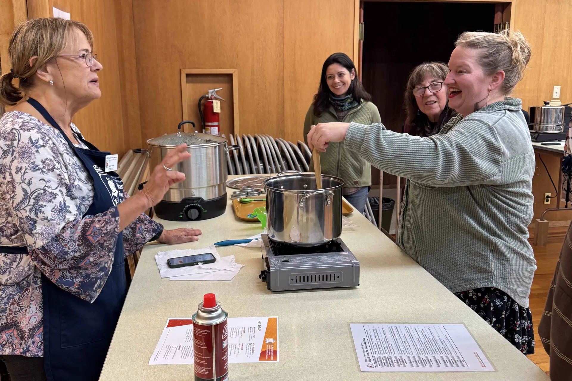 Master Food Preservers making maple-walnut syrup