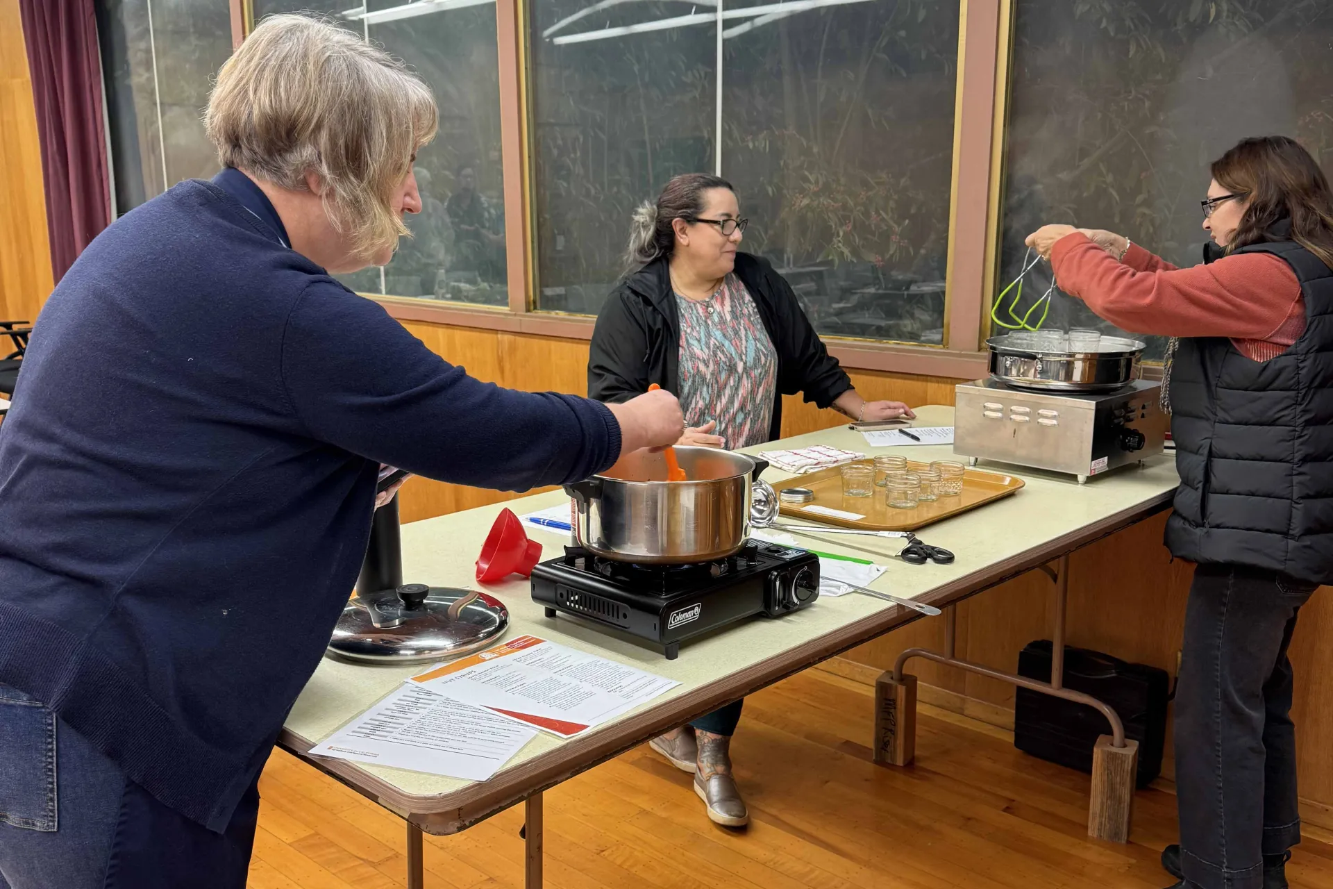 Master Food Preservers making maple-walnut syrup