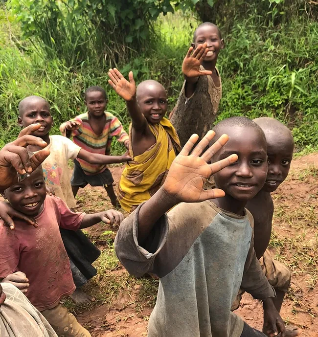 Waving goodbye in Burundi. (Photo courtesy of Jenny Carlson Donnelly)
