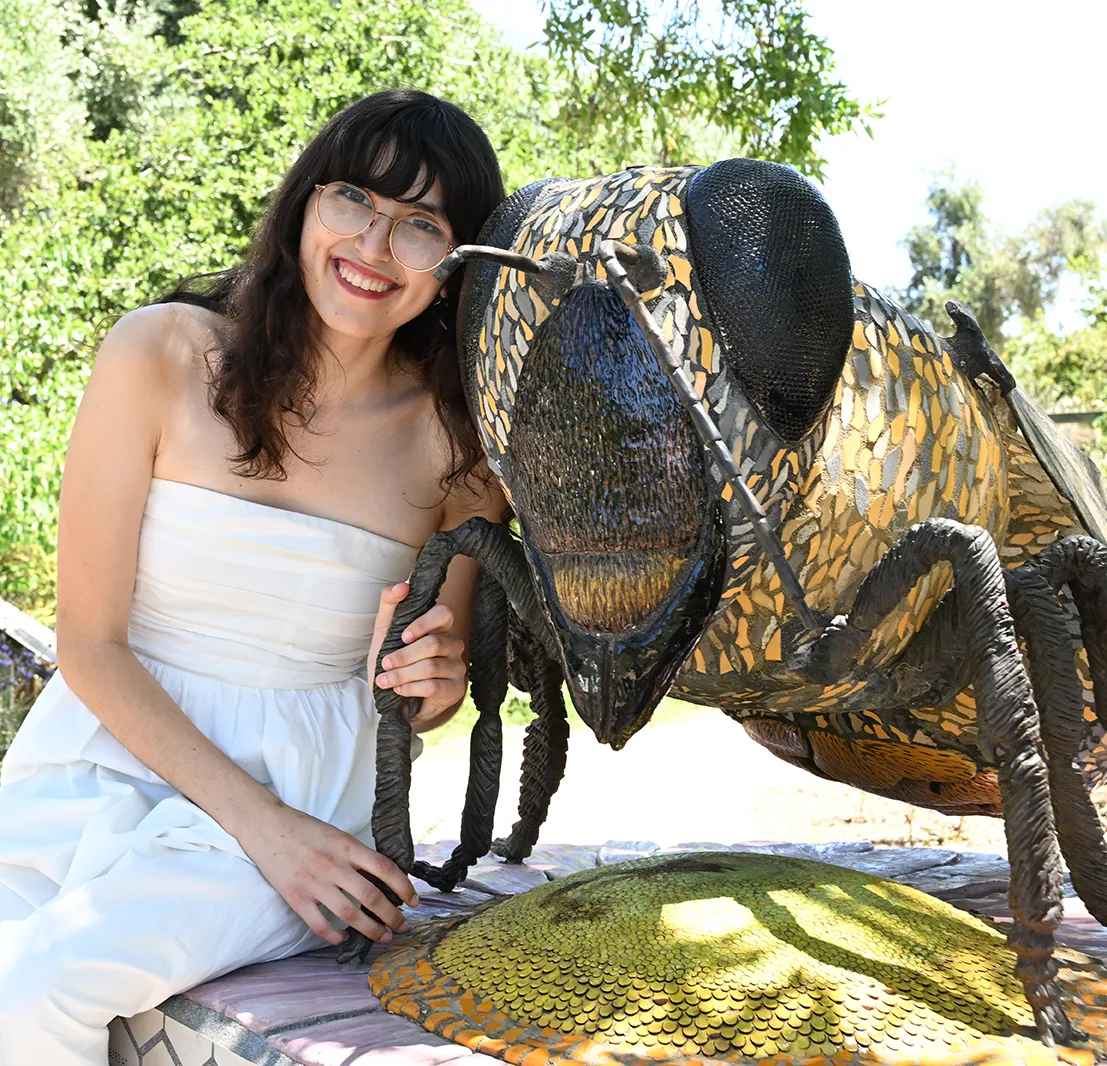 Samantha "Sam" Murray with "Miss Bee Haven" in the UC Davis Bee Haven. (Photo by Kathy Keatley Garvey)