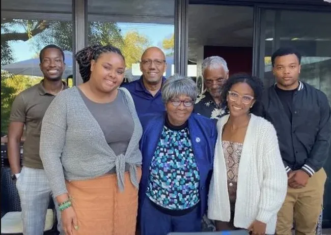 Dr. Mary Blackburn with students in the HBC Emerging Scholars mentorship program 