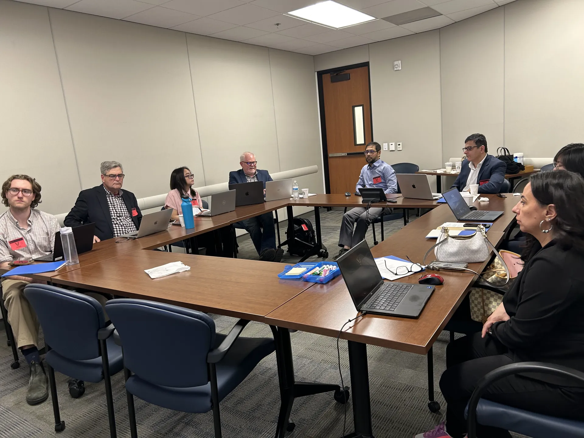 Participants interact during a the workshop meeting.