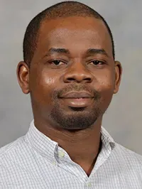 Research scientist Adekunle Adesanya, PhD., of Crop Protection Discovery and Development, Corteva Agriscience.