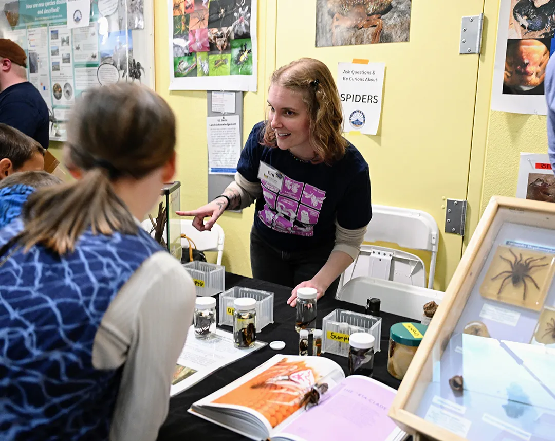 Doctoral candidate Emma "Em" Jochim discussing spiders.