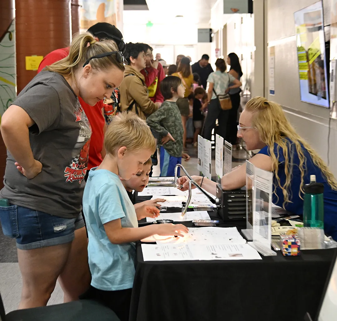 Public Health Biologist Kim Douglass answering questions about ticks at the Bohart Museum of Entomology open house. (Photo by Kathy Keatley Garvey)