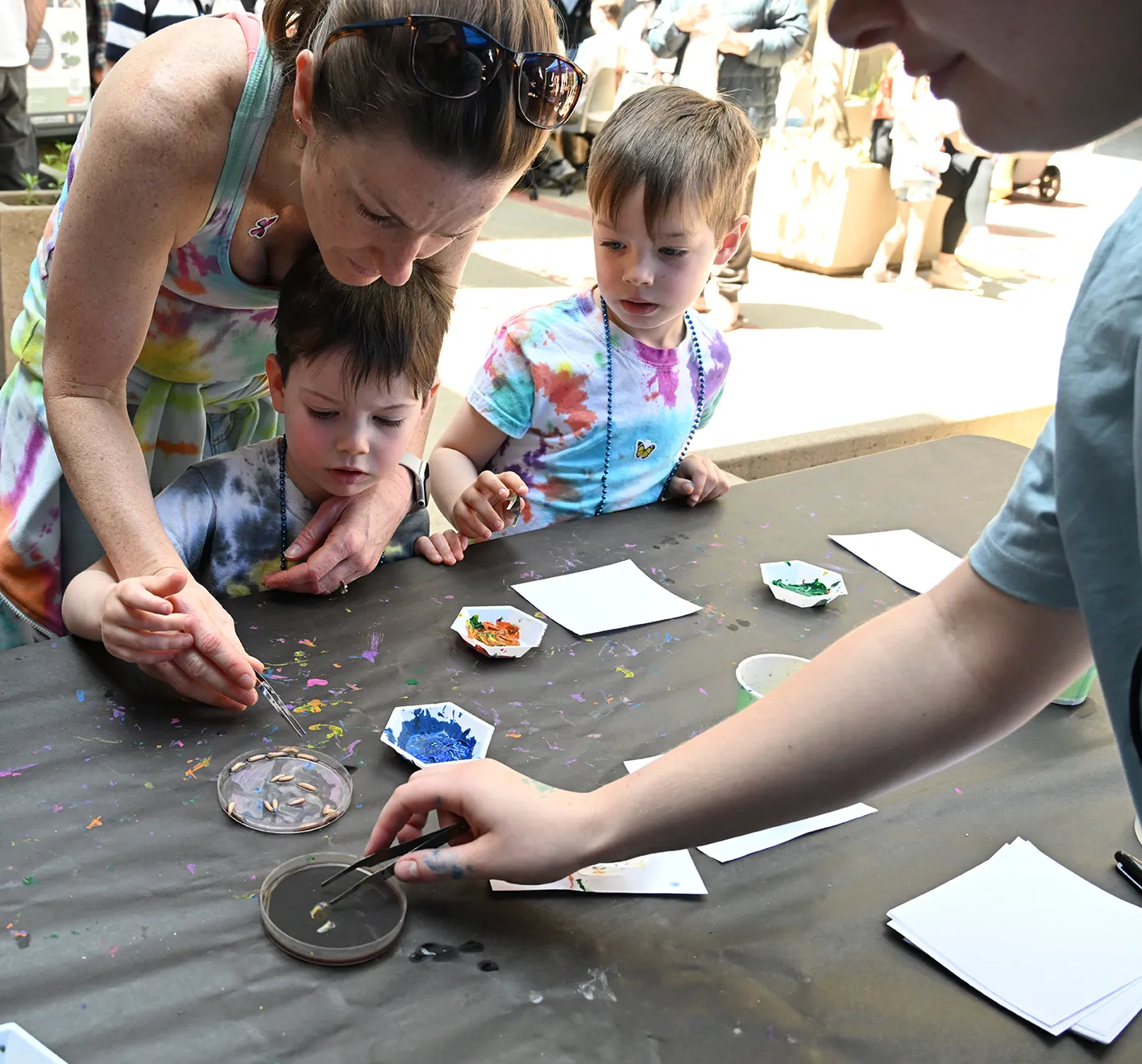 Kids creating maggot art