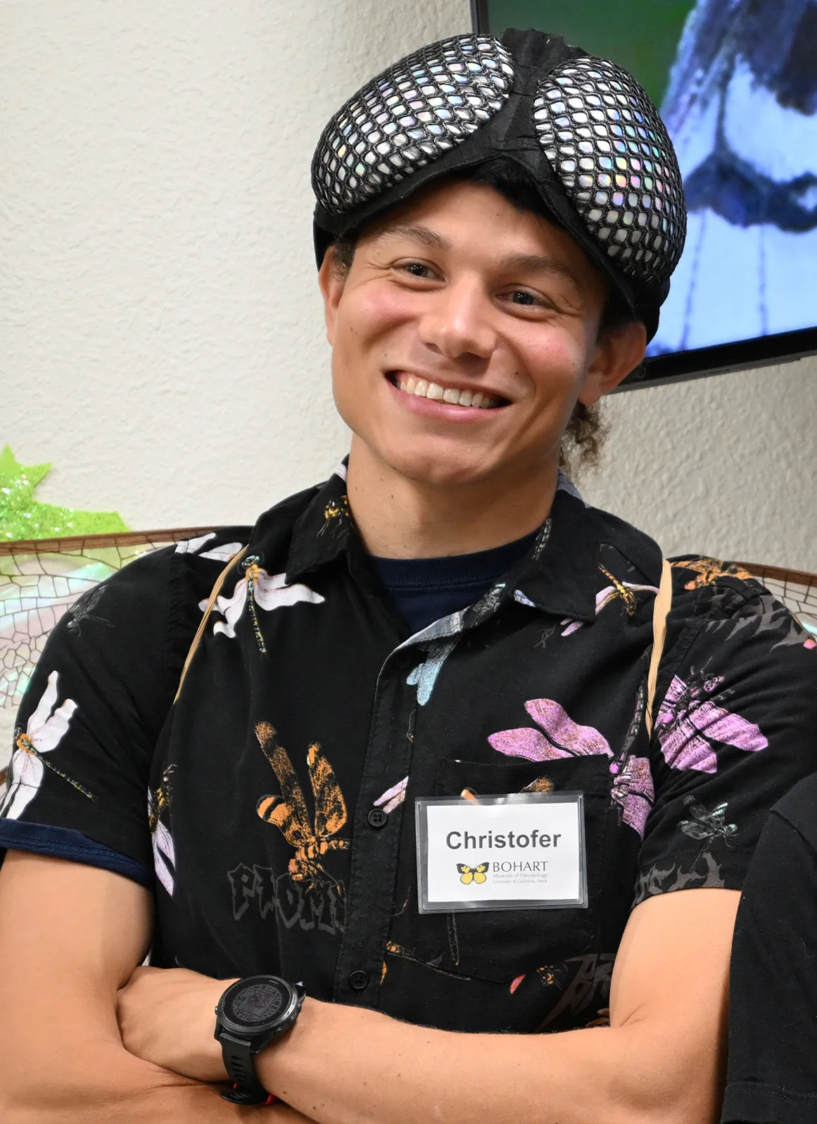 Doctoral candidate Christofer Brothers wearing his dragonfly outfit.