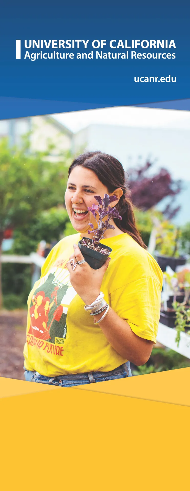 woman holding plant at plant sale