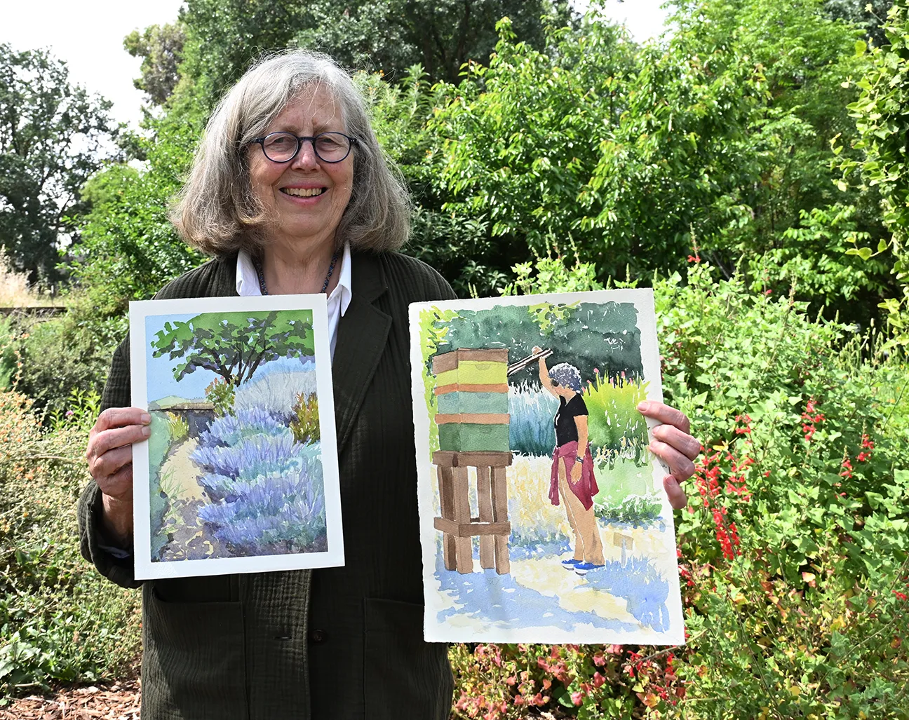 Session leader Lorie Topinkas displays some of the sketches she created in the UC Davis Bee Haven.