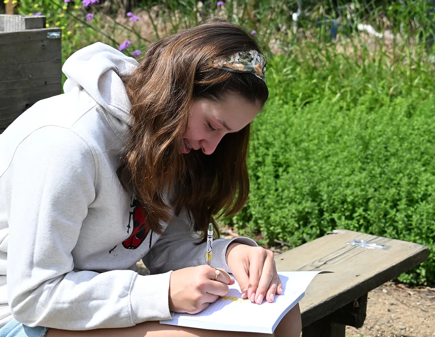 Emma Gable of Davis journaling. 