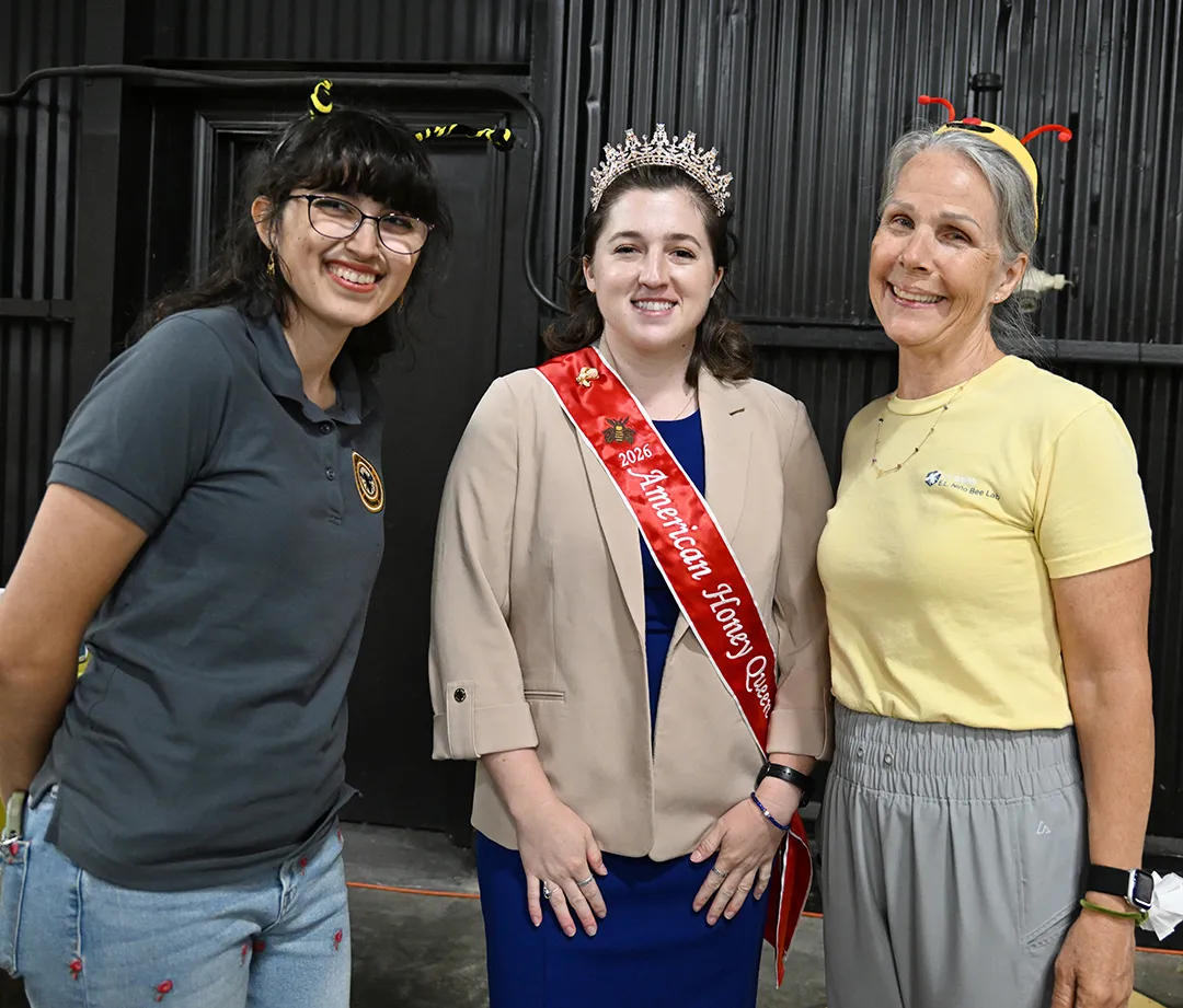 These three beekeepers, all members of the California Master Beekeeper Program (CAMBP) answered questions about bees at the California Honey Festival. From left are Samantha "Sam" Murray, education and garden coordinator of the UC Davis Bee Haven; American Honey Bee Queen and UC Davis alumna Delanie Craighead; and Wendy Mather, co-program manager of CAMBP. (Photo by Kathy Keatley Garvey)