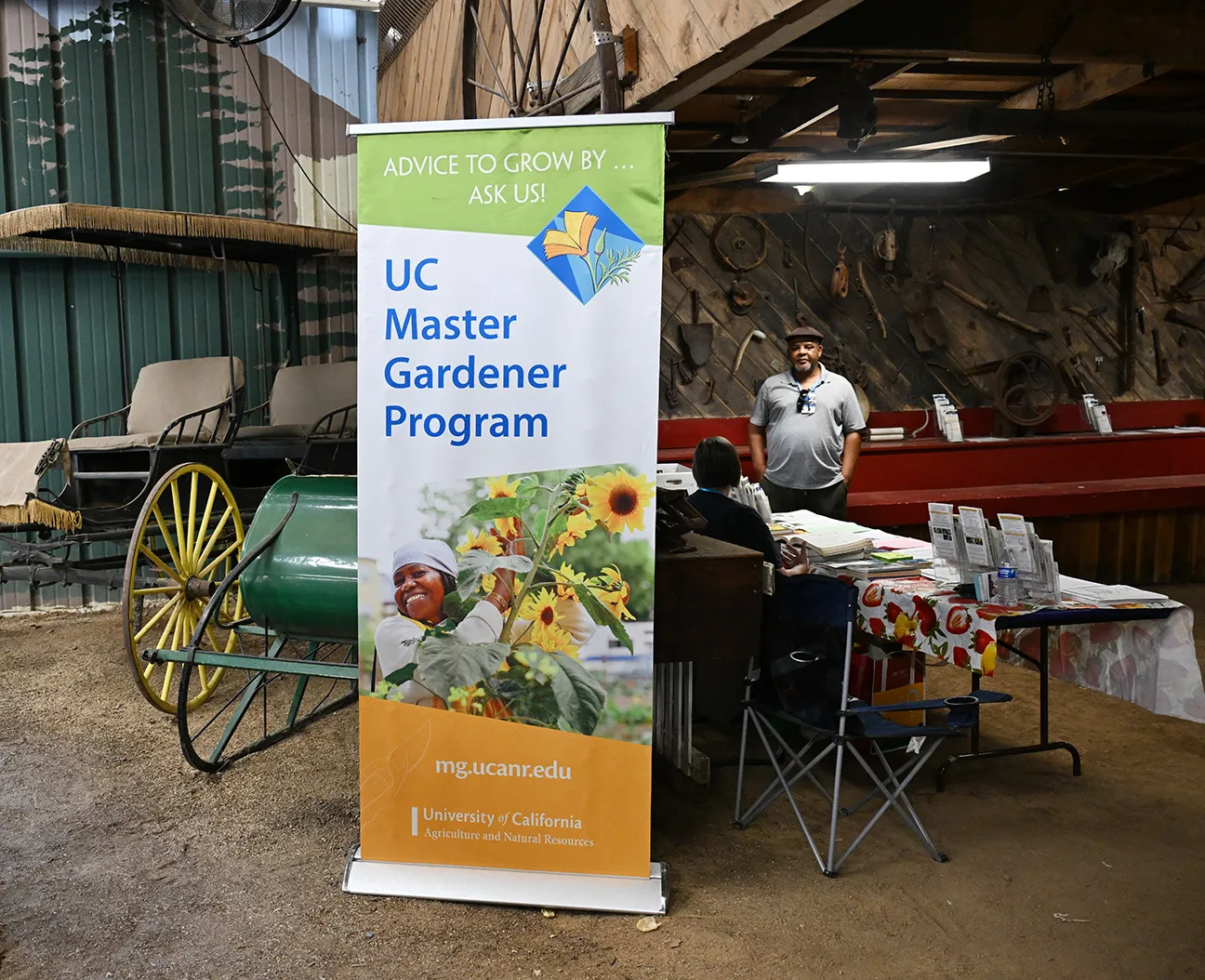 A large sign indicates the location of the UC Master Gardeners.