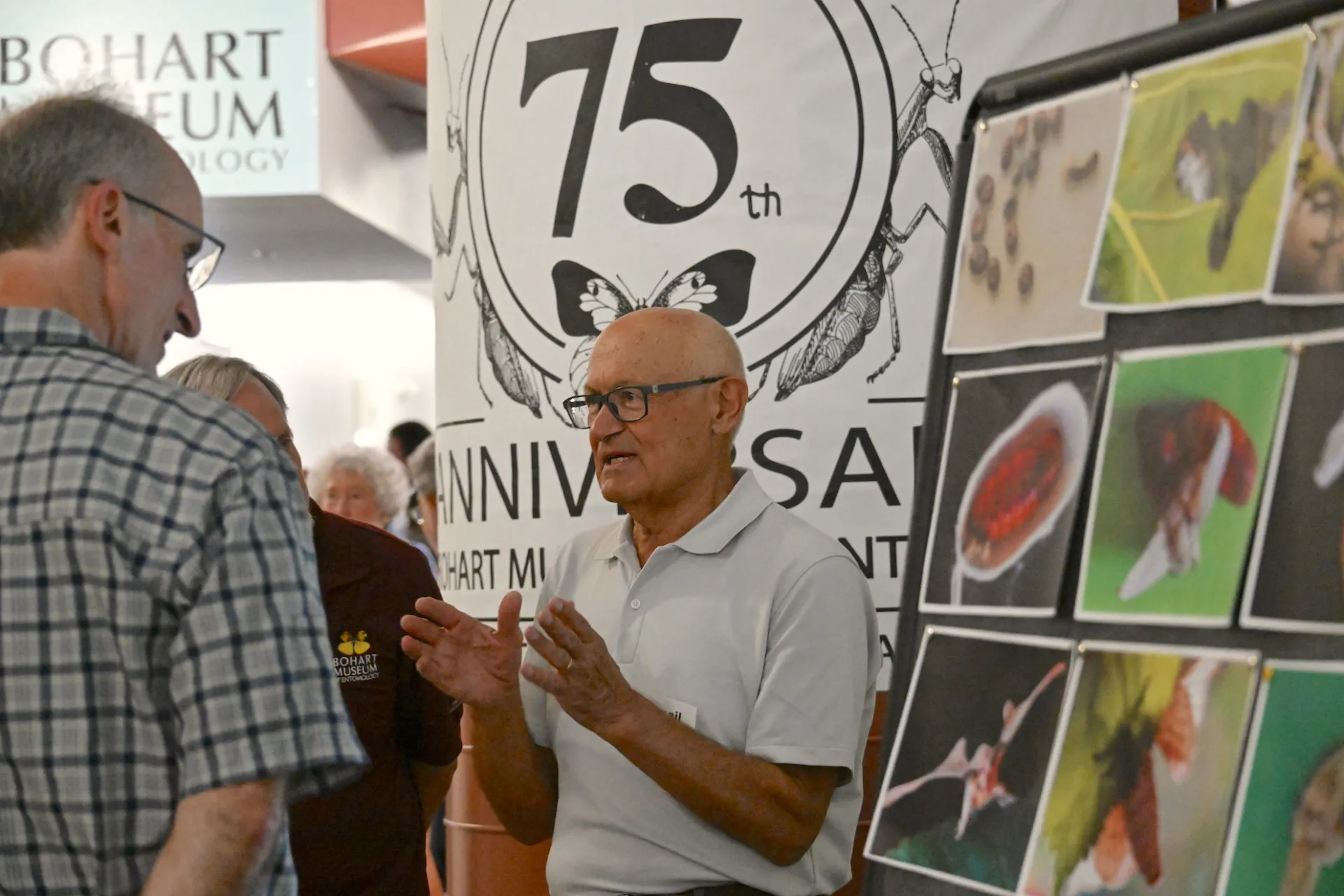 Turkish doctor Ismail Seker discussing silk moths. (Photo by Kathy Keatley Garvey)
