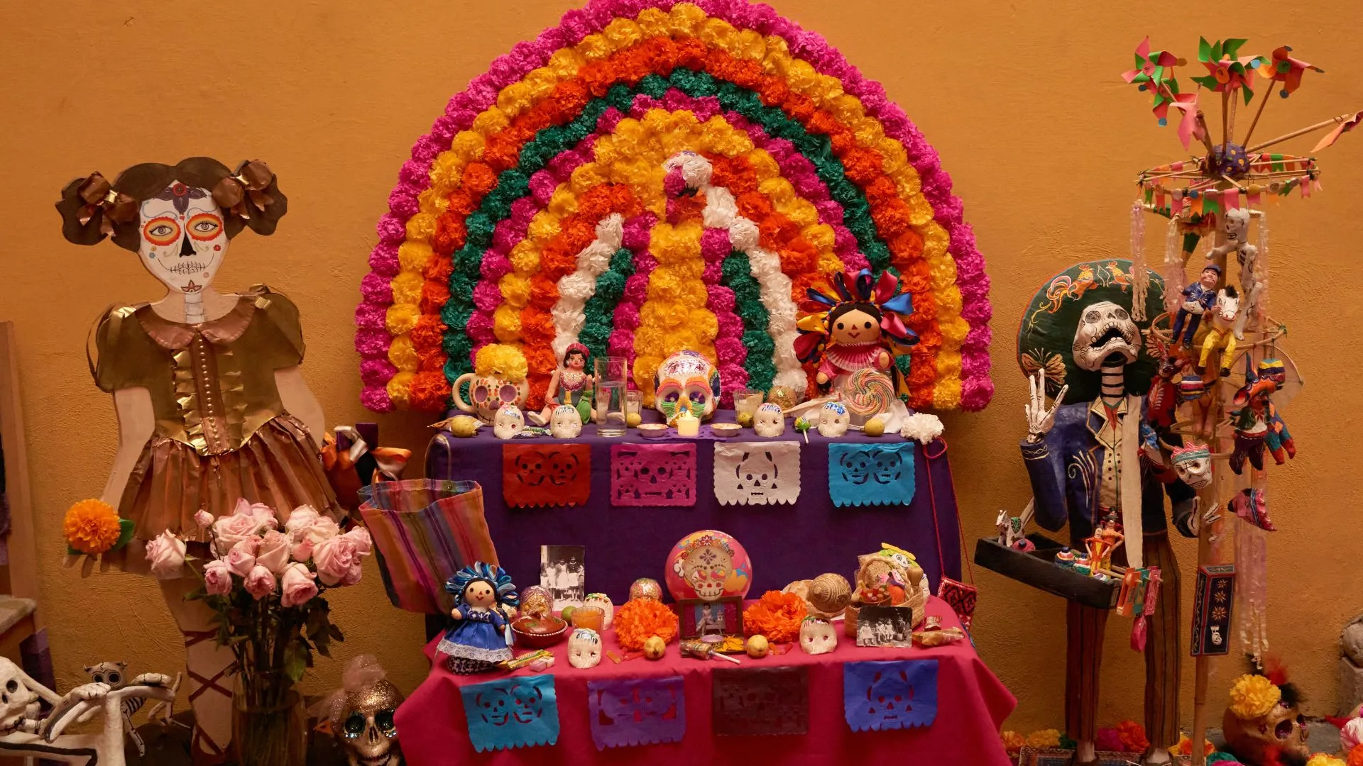 Photo of a two level Day of the Dead Altar with its elements