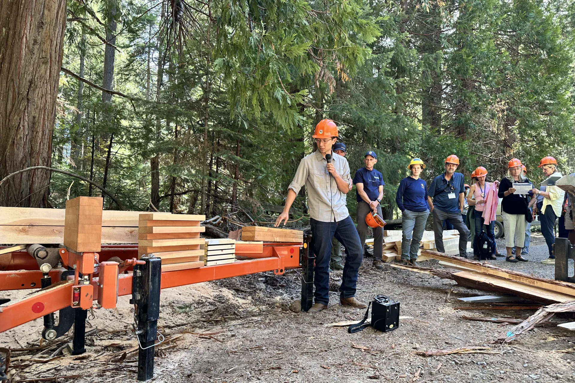 Ricky Satomi points out features of mass timber product during the Blodgett tour