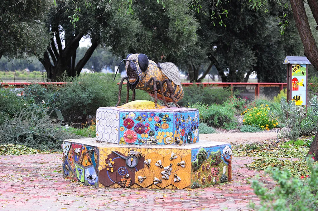 Worker bee sculpture anchors the UC Davis Bee Haven. (Photo by Kathy Keatley Garvey)