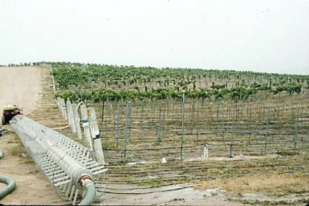 Water and product delivered to each square foot of field surface