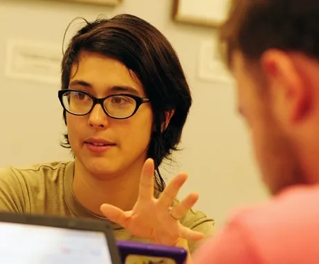 UC Davis debate team member Rei Scampavia makes a point. (Photo by Kathy Keatley Garvey)