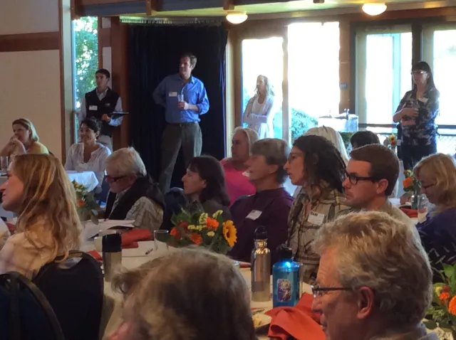 Attendees listen to Ralph Grossi recount key moments in Marin's agricultural history
