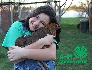 4-H Member with Chicken