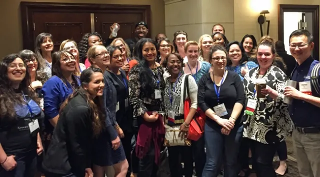 Keynote speaker Antwi Akom (center back in hat) was followed into the hall by ANR members who wanted to know more about Streetwyze.