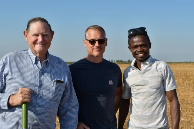 Michael Crowell, Adam Crowell, and Francis Akolbila at Bar Vee Dairy in Turlock, CA