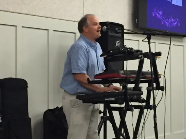 Carl Winter performs at the UC ANR building