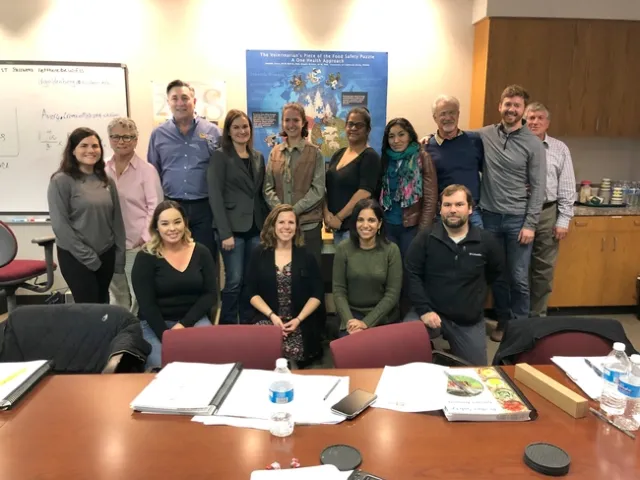 Goldenberg (back row 3rd from left), Gazula (front row green sweater), Cromwell (front row far right), and Pahl (front row 2nd from left), pose for photo with participants from the opening PSA Grower Traiing course in Davis