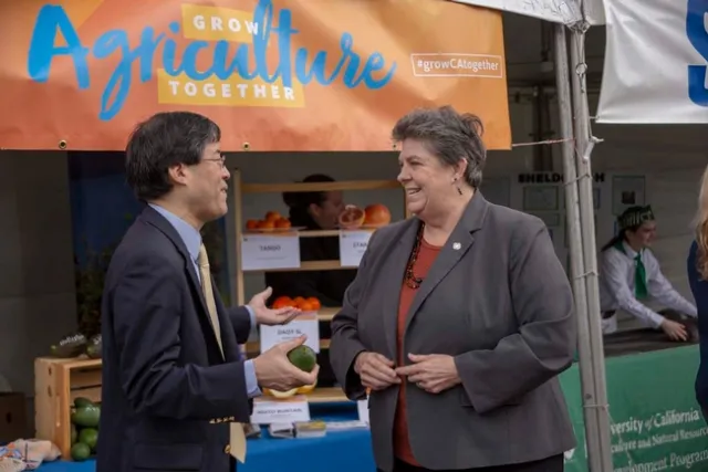 Senator Richard Pan discusses avocado production with VP Humiston.