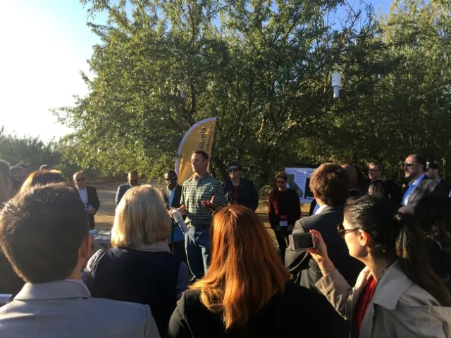 Entomology Advisor David Haviland discusses mating disruption at an educational tour stop sponsored by the University of California