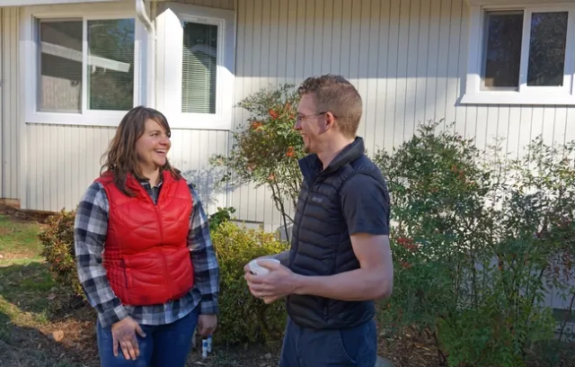 Kate Wilkin and her husband Josiah Johnston in front of their Grass Valley home.
