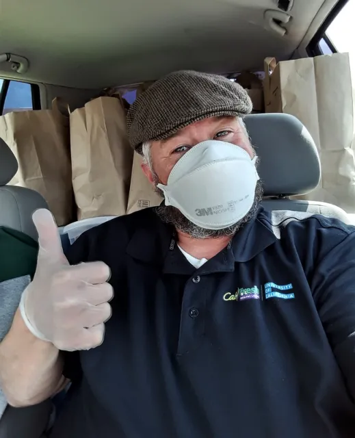 In his spare time, Max Fairbee volunteers to deliver food to elderly Alameda County residents.