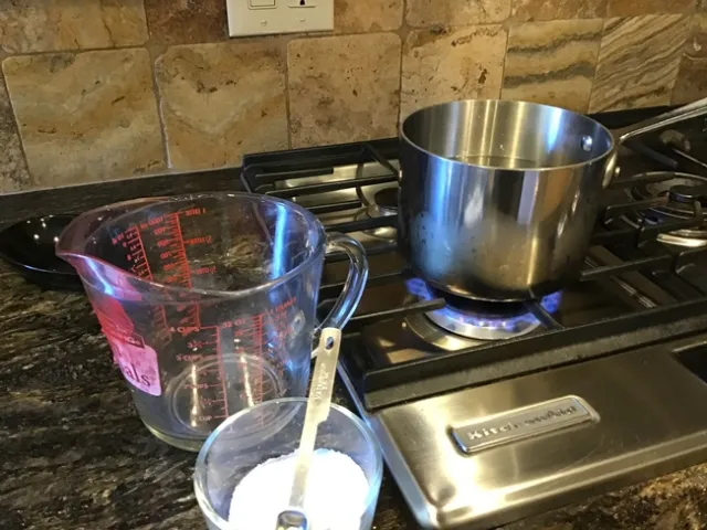 Preparing extra brine on a stove top.