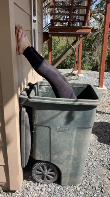 4-h youth look into their trash bin